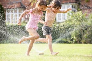 play with water on dry lawn